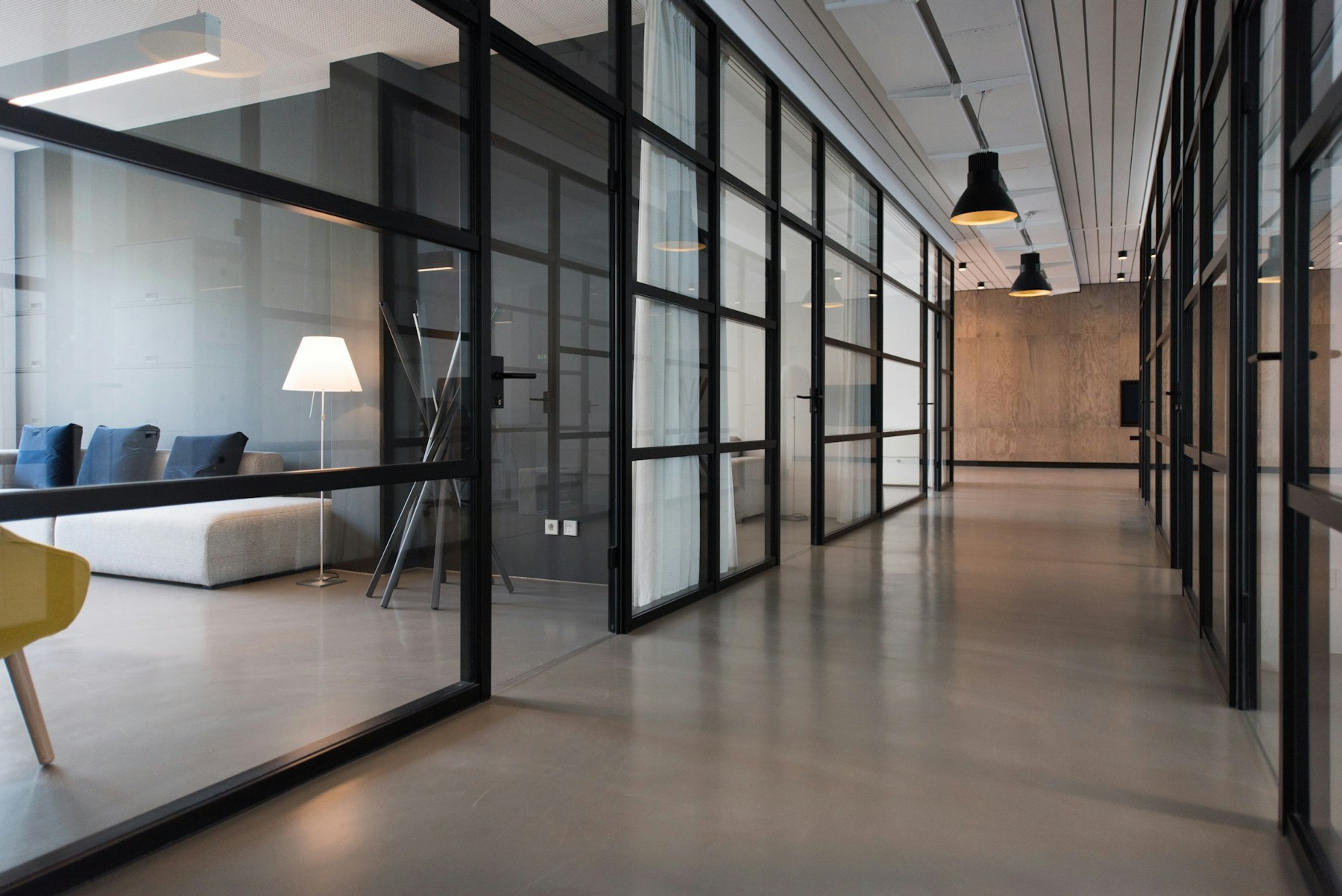 Modern studio workspace with desks and daylight